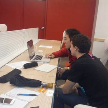 Build zone — shared tables with power at every seat